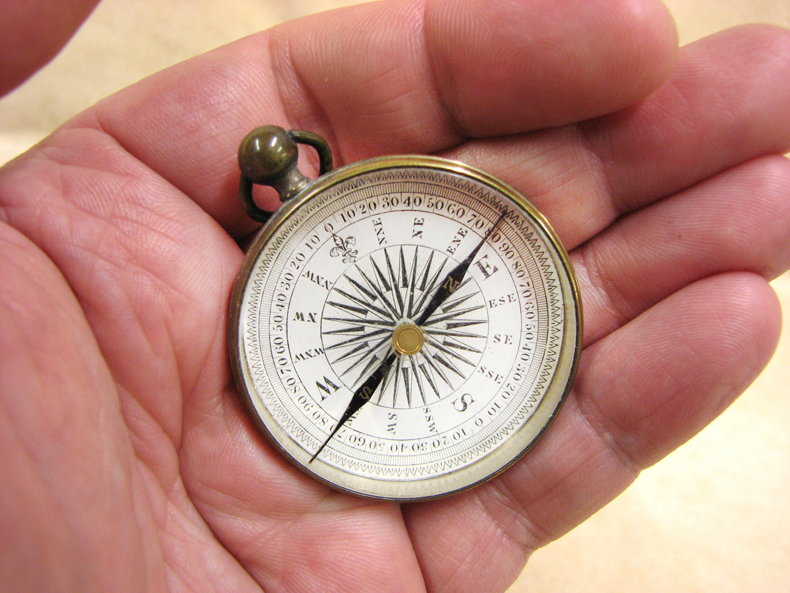 Early Victorian pocket compass in leather covered outer case circa 1860
